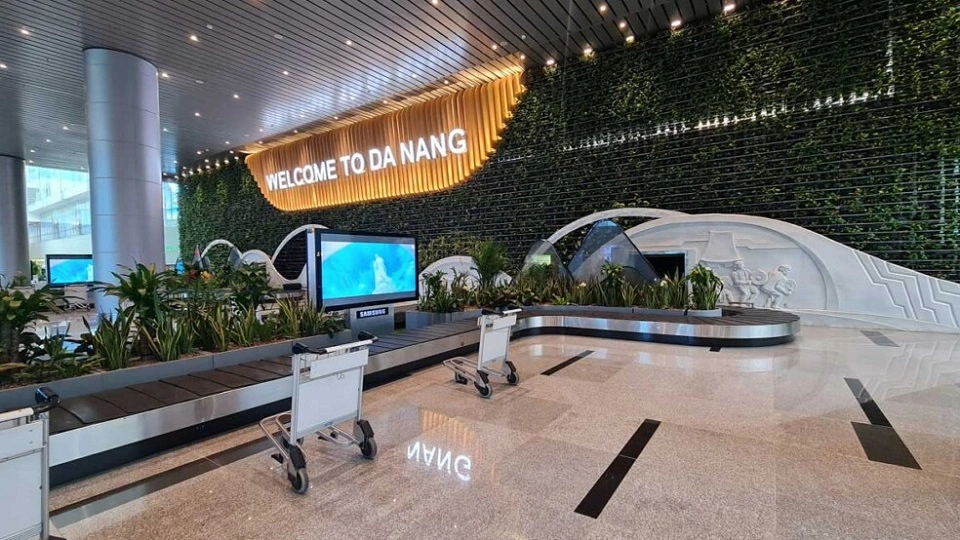 Neatly lined-up trolleys at Da Nang Airport baggage claim
